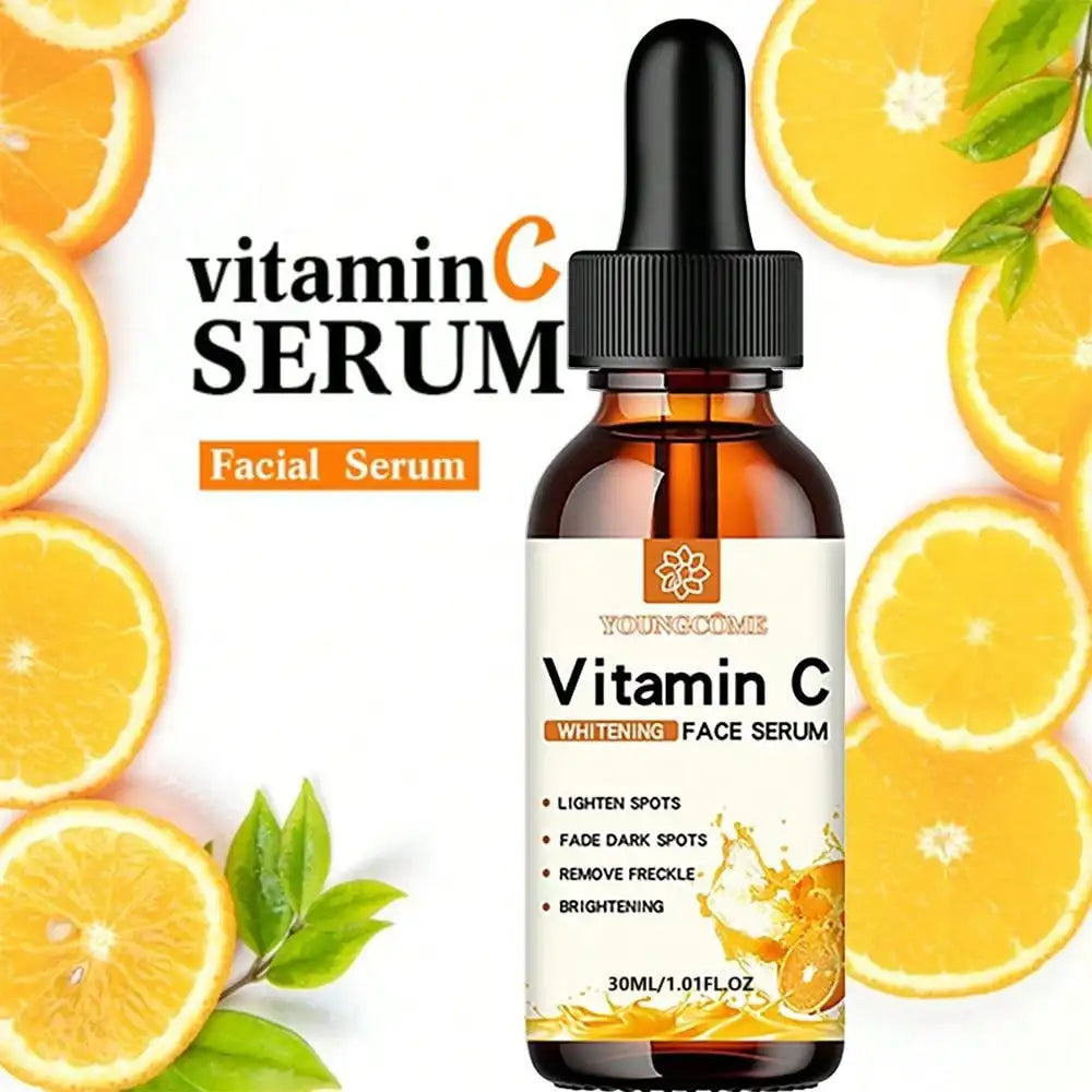 Anwendung Vitamin C Serum im Gesicht, Frau trägt aufhellendes Serum auf für strahlende, ebenmäßige Haut auf